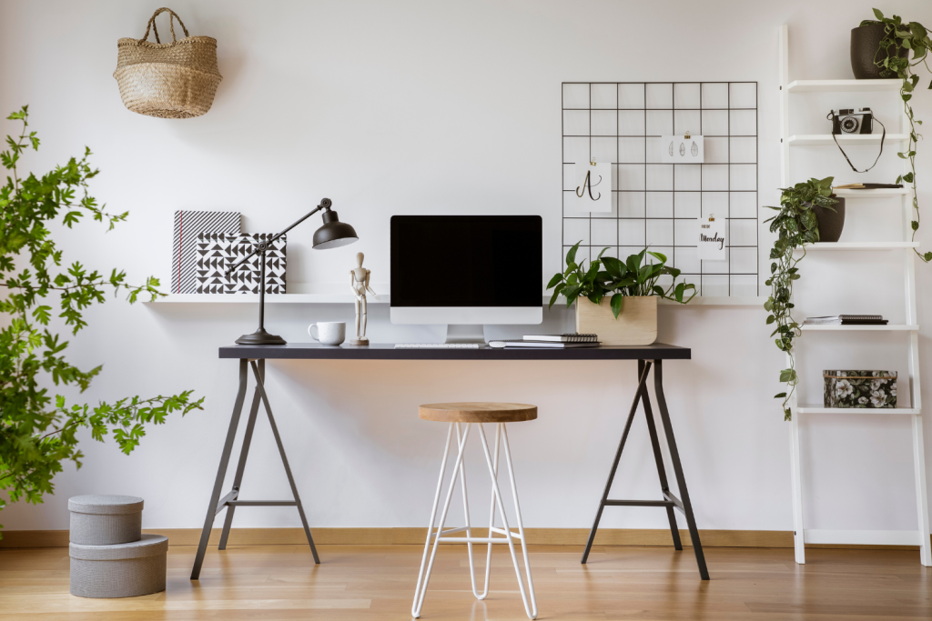 3 Entrepreneurs Who Transformed Their Business with Workflows | a photo of a clean desk in a bright home office. 